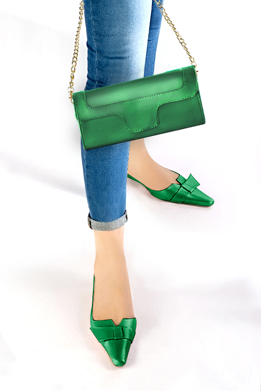 Women's emerald green luxurious elegant clutch for ceremonies, weddings and evenings out. - Worn view